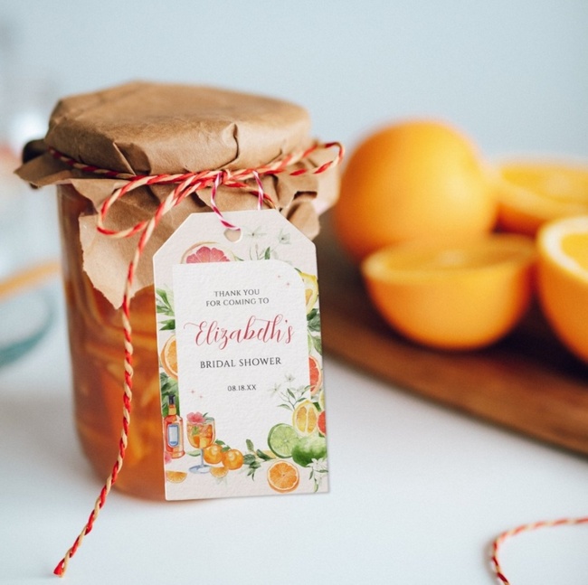 Tropical citrus bridal shower favor tag on a jar of homemade jam.