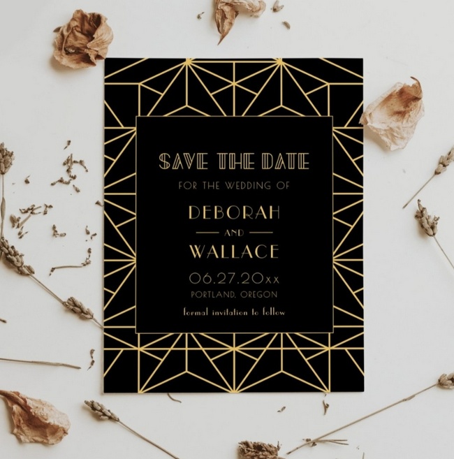 Vintage 1920s Art Deco geometric black and gold save the date card with dried floral accents.